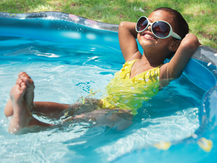 Girl sun tanning in a small pool ?? 