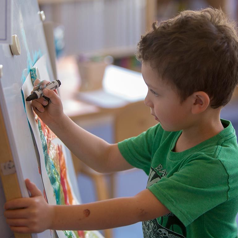 Bright Horizons kindergarten Prep Student creating art