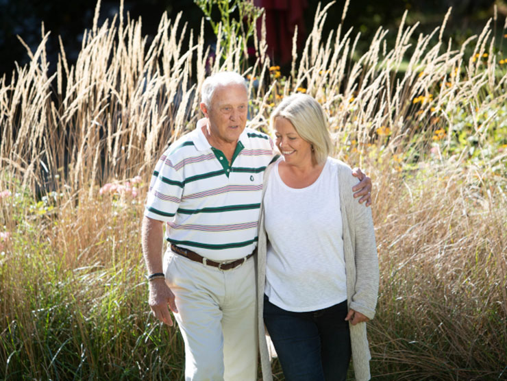 An elderly couple walking in nature ?? 